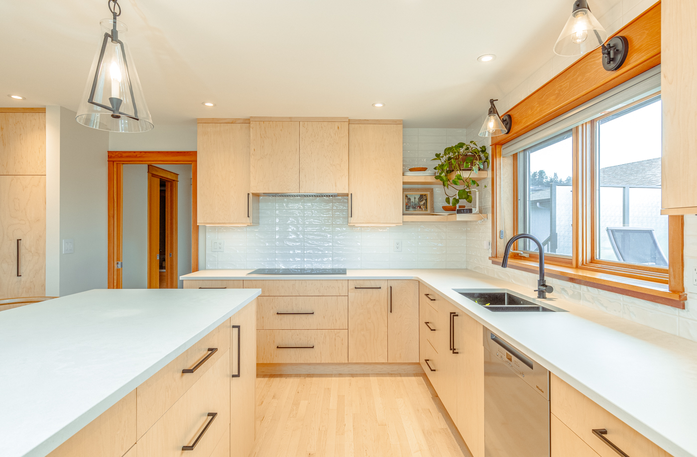 Modern black cabinet hardware on contemporary kitchen cabinets