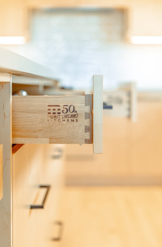 Kitchen cabinet material samples showing wood MDF and laminate finishes