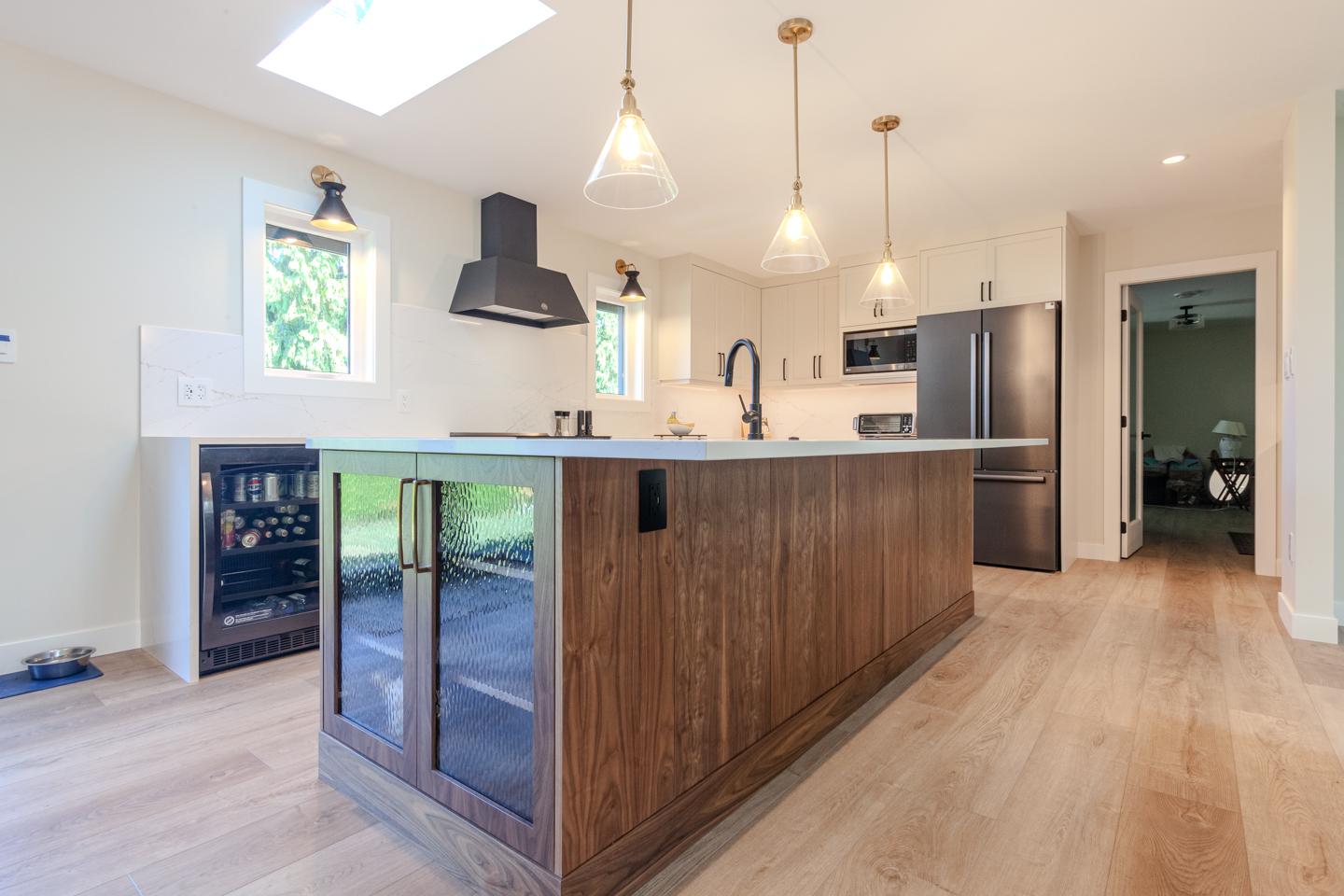 Layered kitchen lighting with pendants and under cabinet lights